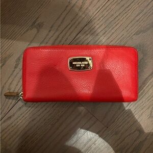 Michael Kors Bright Orange Pebbled Leather Zip Wallet with Gold Plaque